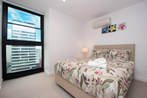 Great City Stay 2BR Free Tram Gym & Pool